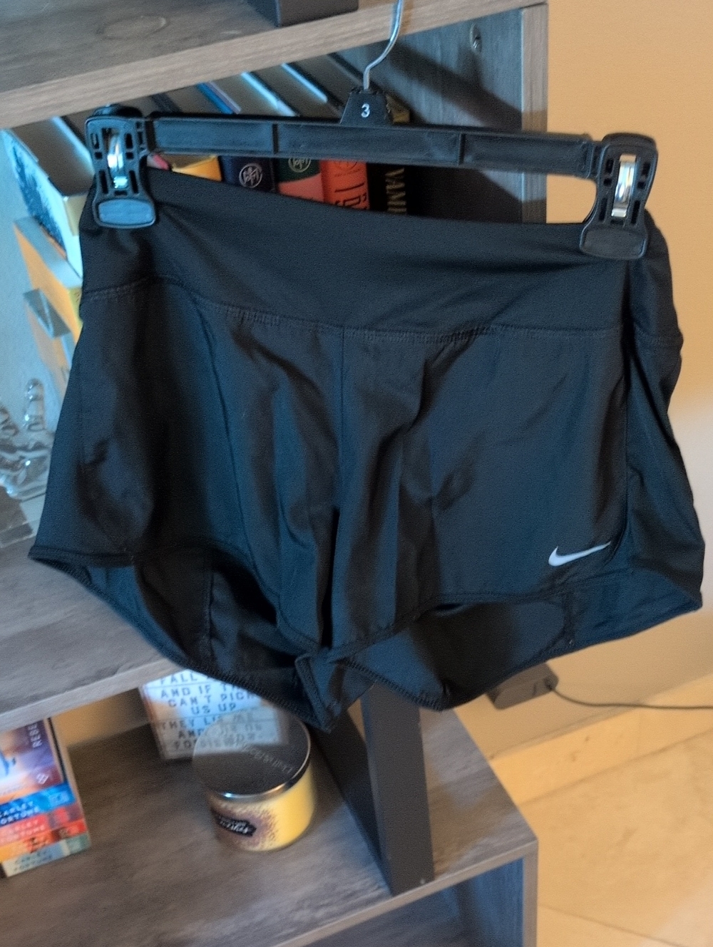 Nike Women's Black Athletic Shorts with Silver Swoosh